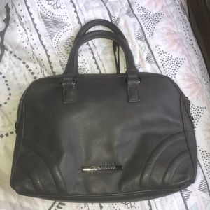 Great bag, transform to crossbody, strap included